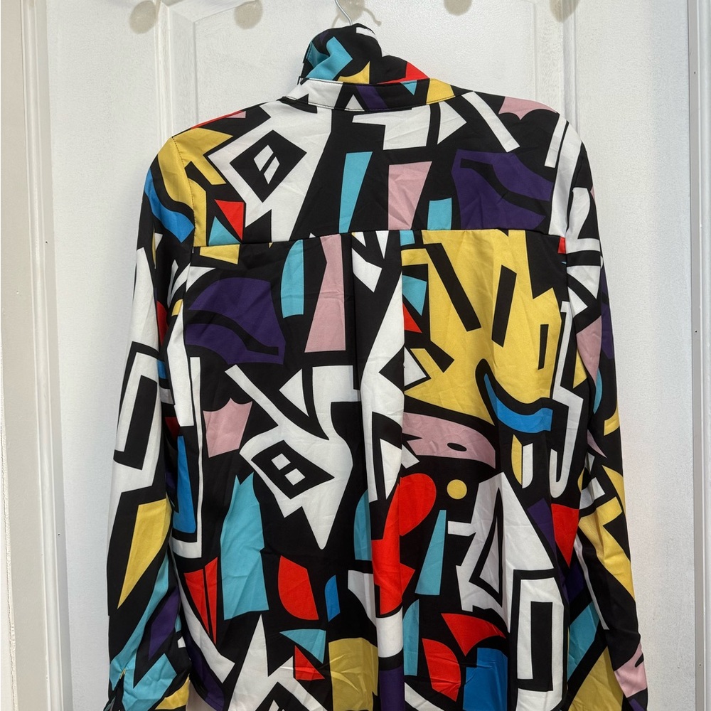 Women’s long sleeve blouse. Great for going out and or work.